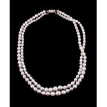 A two row cultured pearl necklace, composed of graduated 4mm to 9mm cultured pearls, to the clasp