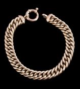 A gold coloured bracelet, composed of polished curb links, to a ring bolt clasp, stamped 14kt, 18.