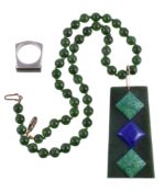A 1980s nephrite pendant, the rectangular shaped nephrite panel with applied carved green panels