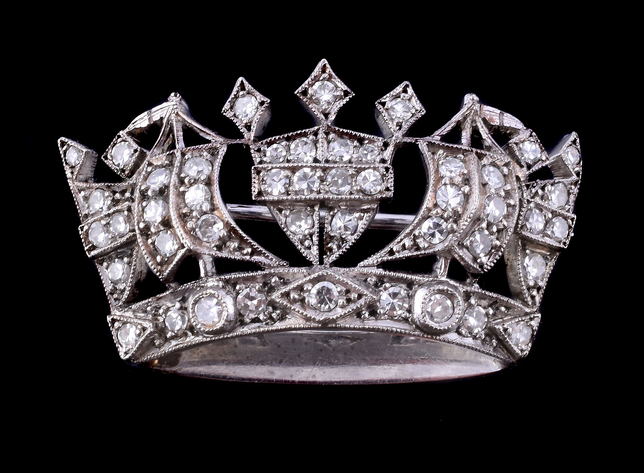 A 1920s Royal Navy diamond brooch, set with eight cut diamonds, 3cm wide