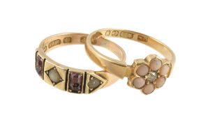 Ω A late Victorian 18 carat gold coral and diamond ring, the central old cut diamond within a