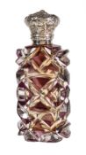 A Victorian silver mounted amethyst flash cut glass scent bottle, unmarked, mid 19th century, with