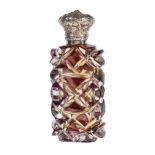 A Victorian silver mounted amethyst flash cut glass scent bottle, unmarked, mid 19th century, with