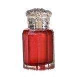 A Victorian silver mounted cranberry glass scent bottle by Miller Brothers, Birmingham 1895, with a