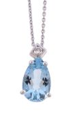 An aquamarine and diamond pendant, the pear cut aquamarine claw set below a brilliant cut diamond,