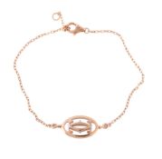 A gold coloured bracelet signed Cartier , the oval panel pierced with the Cartier insignia, with