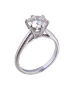 A single stone diamond ring, the brilliant cut diamond weighing 1.34 carats, in a six claw setting,