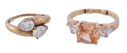 An orange and white stone dress ring, the square shaped orange stone between vari cut white stones,