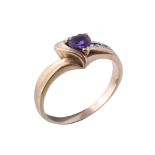 An amethyst and diamond ring, the heart shaped amethyst, claw set with brilliant cut diamond