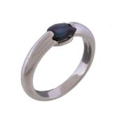 A platinum sapphire ring, the oval cut sapphire in a suspension setting, stamped 950 with full