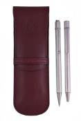 Cartier, Must de Cartier, a stainless steel ballpoint pen and propelling pencil, with reeded