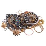 A collection of costume jewellery, to include various brooches; bangles; and further items