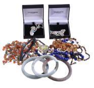 A collection of costume jewellery items , to include a lapis lazuli bead and cultured pearl