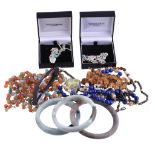 A collection of costume jewellery items , to include a lapis lazuli bead and cultured pearl