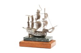 A silver model of the Mary Rose by St. James House Company, Birmingham 1982, mounted on a marble