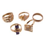 A 22 carat gold band ring , finger size M 1/2; three white stone rings stamped 875; and a further