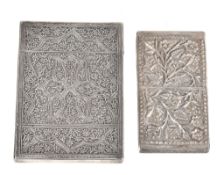 Two late 19th century Indian silver rectangular card cases, unmarked, both slip top, one Kashmiri