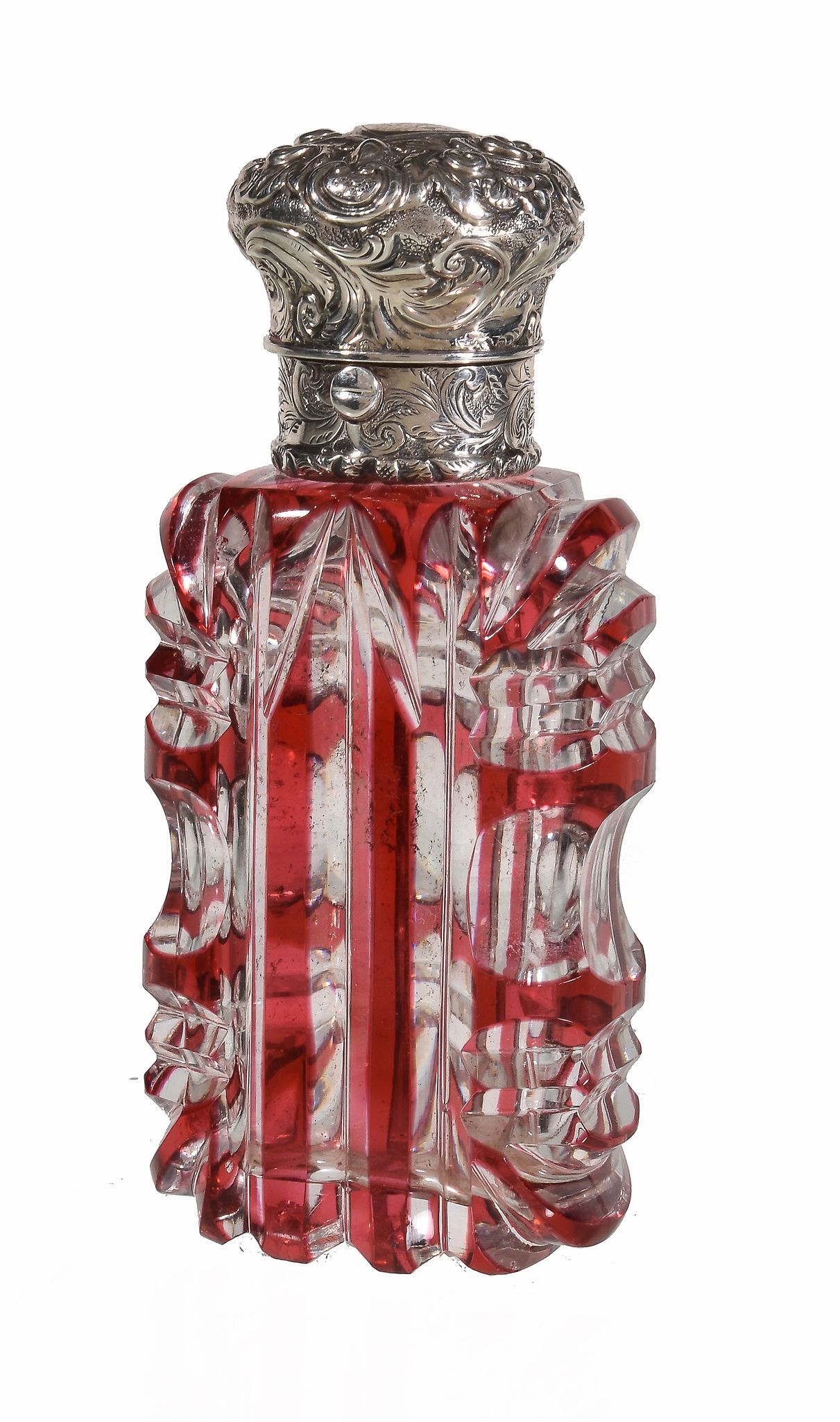 A Victorian silver mounted ruby flash cut glass scent bottle, unmarked, mid 19th century, with a