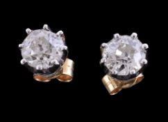 A pair of diamond earrings, the old brilliant cut diamonds, approximately 1.00 carat total, in