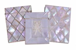 ΩThree Victorian rectangular mother of pearl card cases, all with ivory edging, the first side-