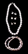 A freshwater cultured pearl necklace , the ovoid freshwater cultured pearls to a lobster claw clasp