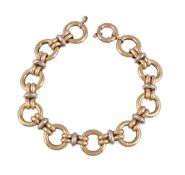 An Italian gold coloured bracelet, composed of circular polished links, to a ring bolt clasp,