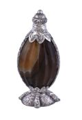 A Continental silver mounted banded agate scent bottle, late 19th century, with scroll and foliate