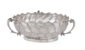 A late Victorian silver three handled bowl by Horace Woodward & Co., London 1891, Rd. No. 173416,