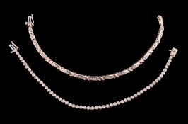A 9 carat gold diamond bracelet, set along the line with brilliant cut diamonds, approximately 1.40