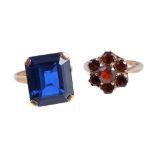 A 9 carat gold garnet ring, set with a cluster of circular cut garnets, stamped 375, finger size O;