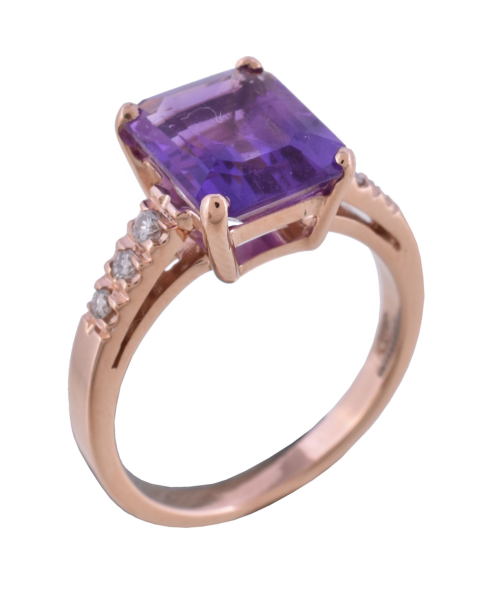 An amethyst and diamond ring, the rectangular cut amethyst claw set between brilliant cut diamond