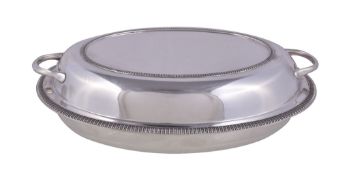 A silver oval entre dish and cover by Lee & Wigfull, Sheffield 1933, with twin fixed loop handles,