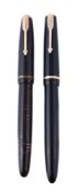 Parker, Duofold, a black lacquer fountain pen, the cap with a gilt metal arrow clip and cap band,