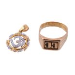 A gold coloured ring, stamped 22k; a white stone Om pendant, stamped 22c, 2.5cm long; 12.1g gross