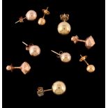 A collection of earrings , comprising a pair of facetted gold coloured ear studs, 9mm wide; a