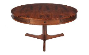 Ω Robert Heritage for Archie Shine, a rosewood drum table, 1960s, the four drawers with inset