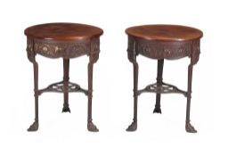 A pair of Art Nouveau cast iron occasional tables , late 19th century, each with mahogany top above