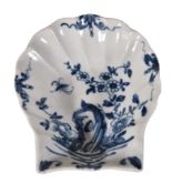 A Worcester blue and white shell-shaped dish painted with a version of the 'Two-Peony Rock Bird'