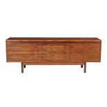 Ω Robert Heritage for Archie Shine, a rosewood sideboard, 77cm high, 213cm wide, 51cm deep; and