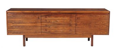 Ω Robert Heritage for Archie Shine, a rosewood sideboard, 77cm high, 213cm wide, 51cm deep; and