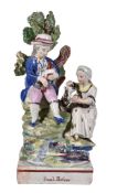 A Staffordshire pearlware 'Rural Pastime' group, first quarter 19th century, on titled base, 22cm