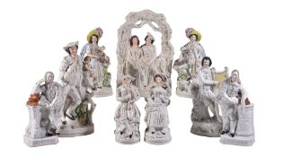 An assortment of Staffordshire figures and groups, mid 19th century, including Shakespeare and