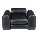 A vintage black leather upholstered lounge armchair, 1960s, attributed to Apple Designs, 64cm high