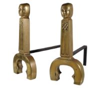 A pair of Gothic revival brass and iron andirons, the uprights with cowled heads supported by