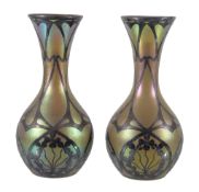 A pair of Loetz silver mounted iridescent glass baluster vases, circa 1910, green with pink tints,