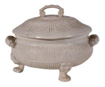 A Staffordshire salt-glazed stoneware ozier-moulded three-legged two-handled tureen and cover ,