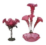 A cranberry and clear-glass four trumpet epergne, late 19th century, 55cm high; and another