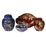 Four pieces of Carlton Ware, comprising: New Stork, a Rouge Royale jar and cover, 16cm high; Bird