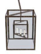 A wrought iron and glazed hanging lantern, 20th century, of square section, the four glass panes