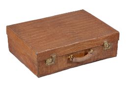 Ω A crocodile suitcase by Drew & Sons, gilt stamped Drew & Sons/ Maker/